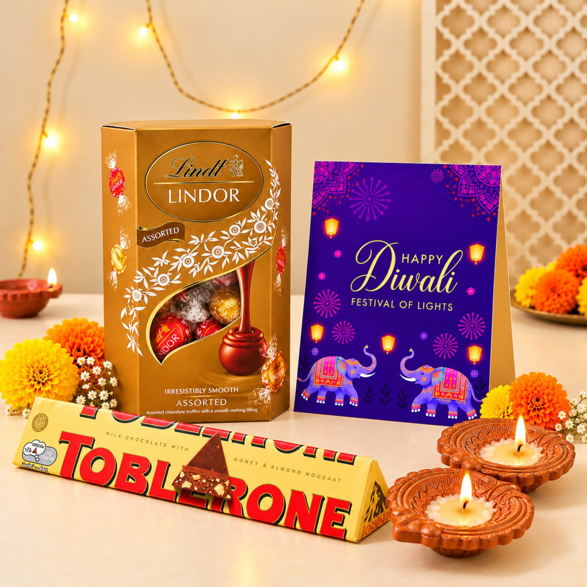 Premium Lindt Lindor Chocolates with Toblerone and  Earthen Diyas on Diwali