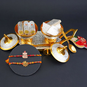 Golden Rakhi Set with Sweets