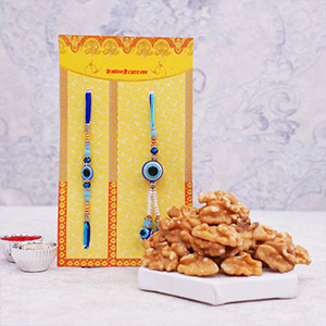Bhaiya Bhabhi Evil Eye Rakhi Set with Walnuts in Potli