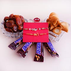 Two Peacock Rakhis with Dates N Snacks