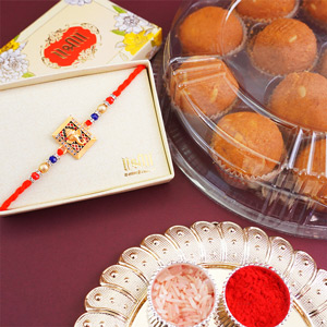 Pious Ganesha Rakhi with Sweets
