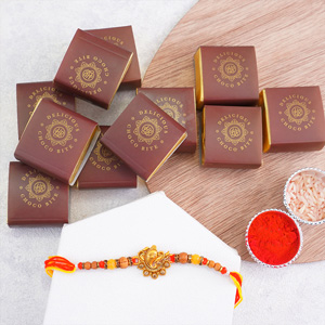 Divine Om Golden Rakhi with Haldiram Sweets
