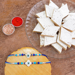 Two Evil Eye Rakhis with Kaju Katli from Haldirams
