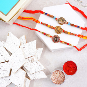 Three Golden Rakhis with Kaju Katli Sweets