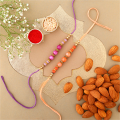 Sneh Peachy Rakhi Set with 250 Grams Almonds