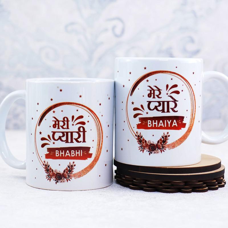 Send Set Of Bhaiya Bhabhi Rakhi With Green Tea Mugs N Chocolates Online