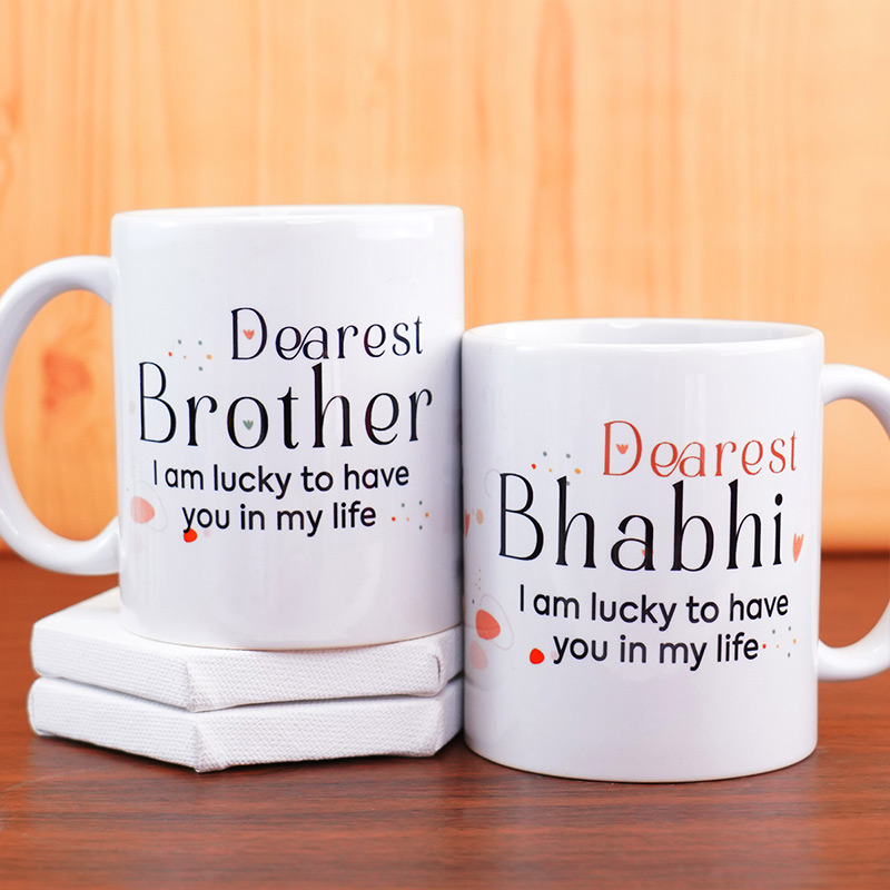 Send Shining Bhaiya Bhabhi Rakhi With Mugs N Premium Chocolates Online