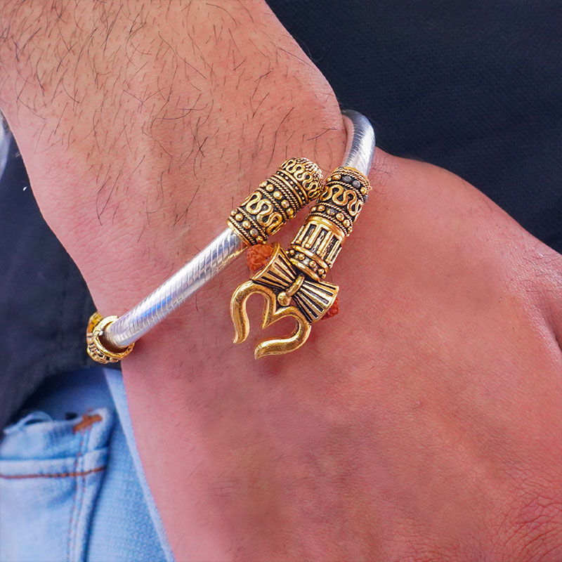 GOLDEN BRACELET | jewelry, bracelet, wrist, colored gold | rose GOLD  Mahadev bracelet is a type of jewelry item typically worn on the wrist. It  is made from rose gold, which is