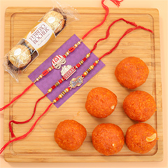 Modern Three Rakhi Set With Laddu And Chocolates - Rakhi Sets to Australia