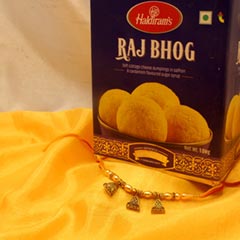 Raj Bhog with Dazzling Rakhi - Rakhi Sweets to Canada