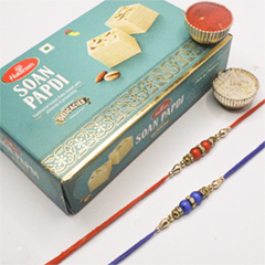 Blue & Red Rakhi Set With Soan Papdi - Send Rakhi to New York