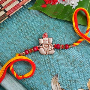 Lord Ganesha Golden Designer Rakhi - Rakhi for Brother
