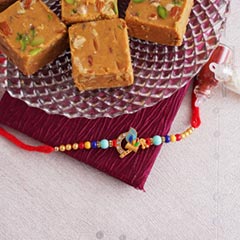 Peacock Feather Rakhi with Haldiram Chana Sattu Burfi - Send Rakhi to Noida