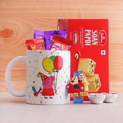 Motu Patlu Rakhi with Chocolates Sweets N Mug