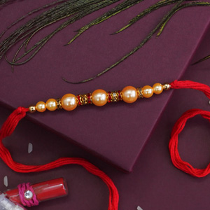 Elegant Pearl Rakhi - Rakhi Sale