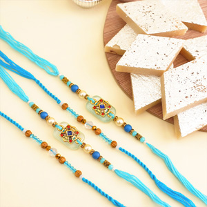 Blue Designer Rakhis with Kaju Katli for Brothers - Rakhi with Sweets
