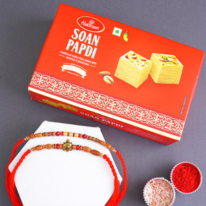 Pearl Rakhi N Golden Tortoise Rakhi with Sweets - Rakhi with Sweets