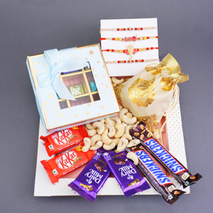 Set of Four Attractive Rakhis with Dry Fruits Gift Pack - Rakhi Gift Hampers