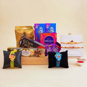 Set of Four Attractive Rakhis with Chocolates Gift Hamper