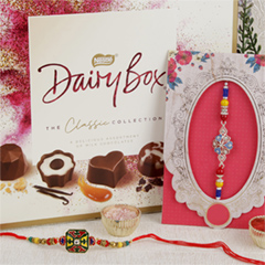 Alluring Rakhi Set of Two with Chocolates - Rakhi Hampers to UK