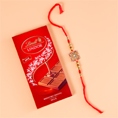 Pious Trishul Rakhi With Lindt Chocolates - Rakhi Chocolates to UK