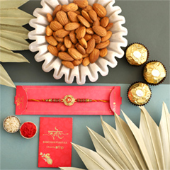 Sneh Traditional Om Rakhi with 3 Ferrero Rocher and Almonds - Rakhi Hampers to UAE