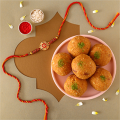 Sneh Traditional Om Rakhi with Besan Ladoo - Rakhi Cards to UAE