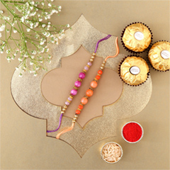 Sneh Peachy Rakhi Set with 3 Ferrero Rocher - Rakhi Chocolates to UAE