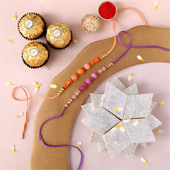 Sneh Peachy Rakhi Set with 250 Grams Kaju Katli and 3 Ferrero Rocher - Rakhi Chocolates to UAE