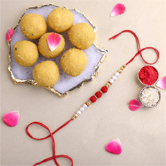 White Pearl And Velvet Beads Rakhi with 500 grams Besan Ladoo - Rakhi Sweets to UAE