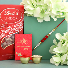 White Pearl And Velvet Beads Rakhi with Lindt Lindor - Rakhi Cards to UAE