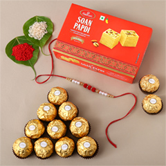 White Pearl And Velvet Beads Rakhi with 250 Grams Soan Papdi and Ferrero Rocher - Rakhi Chocolates to UAE
