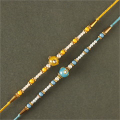 Sneh Vibrant Set Of 2 Pearl Rakhis to Dubai - Rakhi Cards to UAE