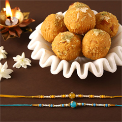 Sneh Vibrant Set Of 2 Pearl Rakhis with 500 Grams Besan Ladoo - Rakhi Sweets to UAE