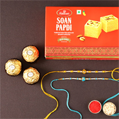 Sneh Vibrant Set Of 2 Pearl Rakhis with 250 Grams Soan Papdi and 3 Ferrero Rocher - Rakhi Sets to UAE