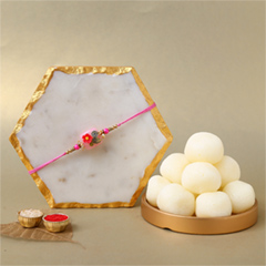 Fancy Stone Rakhi with 1 Kg Rasgulla Tin - Rakhi Sweets to UAE