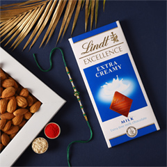 Sneh Fancy Green Rakhi with Lindt Chocolate Bar and Almonds - Rakhi Sweets to UAE
