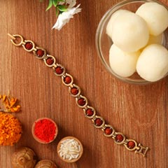Rudraksha Bracelet Style Rakhi And Rasgulla - Rakhi Sweets to UAE