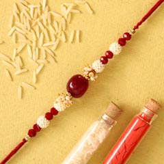 Red Beads Pearl Designer Rakhi - Exclusive Rakhi to UAE
