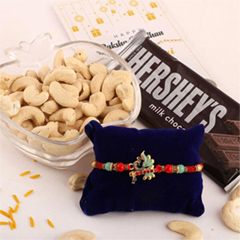 Charming Peacock Rakhi and Hersheys with Cashew - Rakhi and Dry Fruits to USA