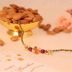 Dazzling Rakhi with Almond - Rakhi and Dry Fruits to USA